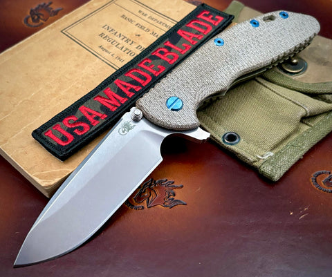 Specialty Hinderer XM-24 Spearpoint Battle Bronze Ti Textured Natural Micarta with S45VN SW Blade Blue Ti HW