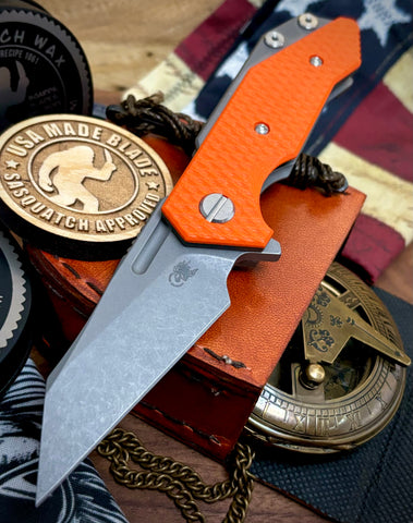 Wharnie Hinderer Half Track Gen 2 Orange G10 Working Finish Ti with Working Finish Magnacut Blade