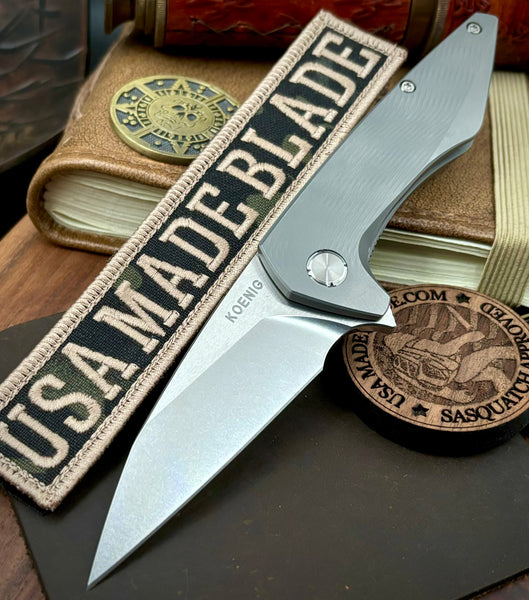 Koenig Mini Goblin Brightwash M390 Blade with Polished Flats with Sea Pattern Full Ti Handles, Silver Back Spacer, and Blasted Clip