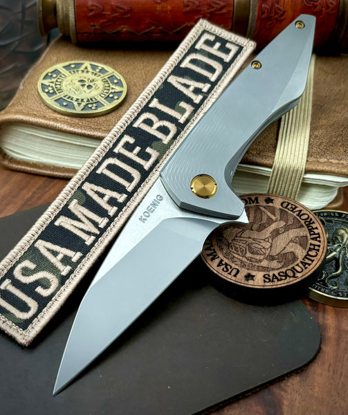 Koenig Mini Goblin Burnished M390 Blade with Polished Flats with Sea Pattern Full Ti Handles, Bronze Ti Back Spacer, Bronze Ti HW and Blasted Clip