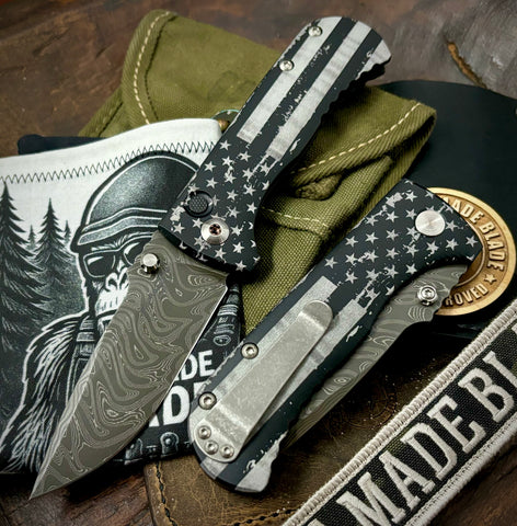 Battle Stars & Stripes Defiant-7 Talos Button Lock with Black Boomerang Stainless Chad Nichols Damascus Blade and Black Hardcoat Anodized Aluminum Handles - USA MB