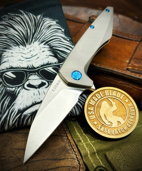 Koenig Mini Goblin Brightwash M390 Blade with Polished Flats with Sea Pattern Full Ti Handles, Blue Ti Back Spacer, Blue Ti HW and Blasted Clip