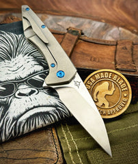 Koenig Mini Goblin Brightwash M390 Blade with Polished Flats with Sea Pattern Full Ti Handles, Blue Ti Back Spacer, Blue Ti HW and Blasted Clip