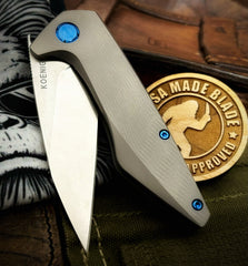 Koenig Mini Goblin Brightwash M390 Blade with Polished Flats with Sea Pattern Full Ti Handles, Blue Ti Back Spacer, Blue Ti HW and Blasted Clip