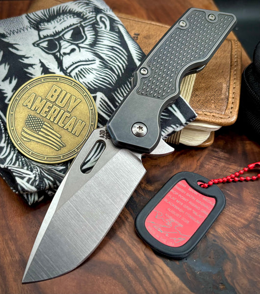 A2D Mark 1 Flipper Medium Stonewashed Drop Point Rising Grind Magnacut Blade Flat M16 Grip Blackwash Ti on Bearing