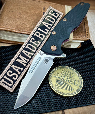 High Res Battle Purple Hinderer Eklipse 3.5" Skinny Fullered Harpoon Spanto Black G10 Anodized Working Finish Ti Stonewashed Magnacut Blade with bronzed out hardware