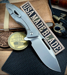 Koenig Arius Patterned Ti Stonewashed M390 Blade with Polished Flats and Ti Hardware AR11211111