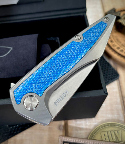 Koenig Mini Goblin Blue Twill Inlay Brightwashed M390 Blade with Polished Flats and Silver Ti HW
