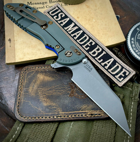 Ammo Can Green Hinderer XM-24 Skinny Wharncliffe Blue/Black G10 with S45VN Working Finish Blade Bronzed Out Hardware