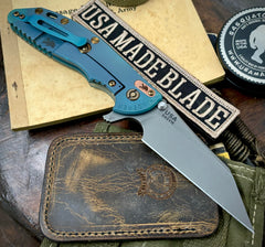 High Res Battle Green Hinderer XM-24 Skinny Wharncliffe Translucent Green G10 with S45VN Working Finish Blade Black Nitride and Bronzed Out Hardware Squatched