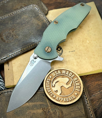 Ammo Can Green Hinderer Jurassic Slicer Translucent Green G10 Anodized Working Finish Ti Magnacut Stonewashed Blade Bronzed Out HW - USA MB