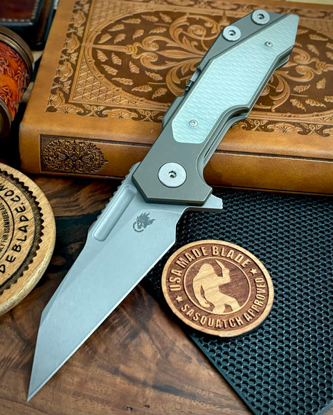 Hinderer Full Track Wharncliffe Battle Bronze Ti with Translucent Green G10 and Working Finish S45VN Blade