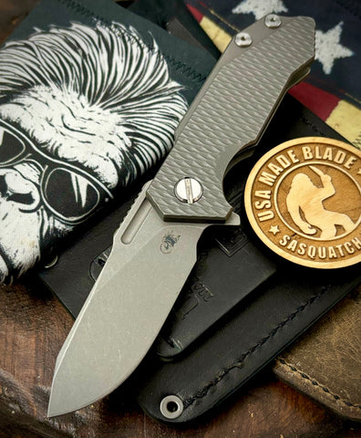 Slicer Hinderer Half Track Gen 2 Textured Ti Working Finish Presentation Side, Smooth Ti Lockside Magnacut Working Finish Blade