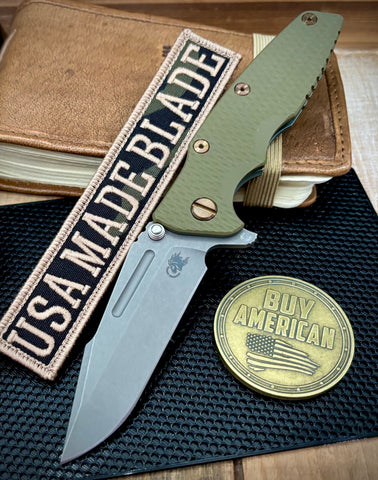 Ammo Can Green Hinderer Eklipse 3.5" Skinny Fullered Harpoon Spanto OD Green G10 Anodized Working Finish Ti Working Finish Magnacut Blade with bronzed out hardware