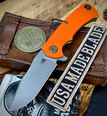 Ammo Can Green Project X Orange G10 Anodized Working Finish Ti with Working Finish S45VN Clip Point Blade and Bronzed Out HW