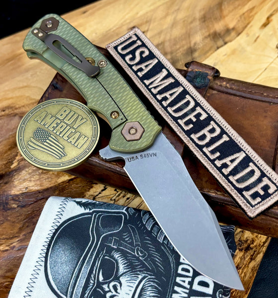 Battle Green Project X Coyote G10 Anodized Working Finish Ti with Working Finish S45VN Clip Point Blade and Bronzed Out HW