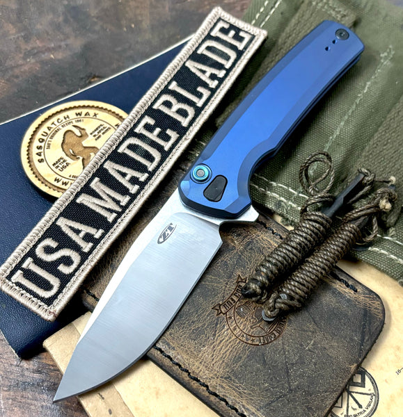 ZT0044 Blue Anodized Full Ti Button Lock Flipper S45VN from Zero Tolerance Knives