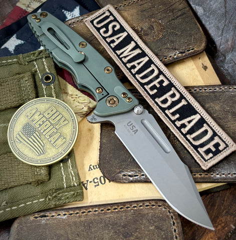 Ammo Can Green Hinderer Eklipse 3.5" Skinny Fullered Harpoon Spanto OD Green G10 Anodized Working Finish Ti and Working Finish Magnacut Blade with bronzed out hardware
