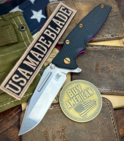 High Res Purple Hinderer Eklipse 3.5" Skinny Fullered Harpoon Spanto Black G10 Anodized Stonewash Ti Stonewashed Magnacut Blade with bronzed out hardware
