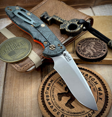 Topo Ammo Can Green Hinderer XM-18 3.5" Recurve Non-flipper Orange G10 Working Finish Ti Stonewashed Finish Magnacut Blade Bronzed Out HW and Squatched Clip