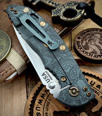 Topo Ammo Can Green Hinderer XM-18 3.5" Recurve Non-flipper Orange G10 Working Finish Ti Stonewashed Finish Magnacut Blade Bronzed Out HW and Squatched Clip