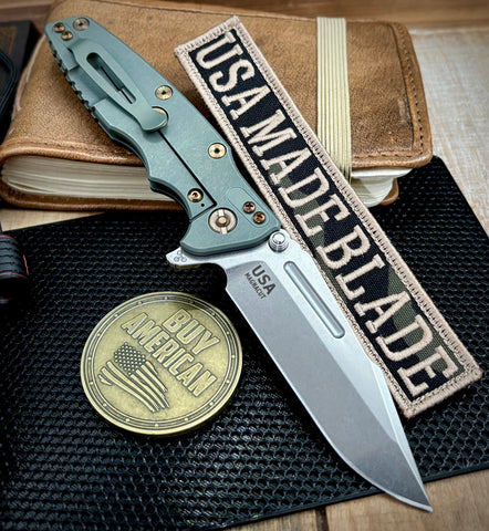 Ammo Can Green Hinderer Eklipse 3.5" Skinny Fullered Harpoon Spanto Black G10 Anodized Working Finish Ti Stonewashed Magnacut Blade with bronzed out hardware