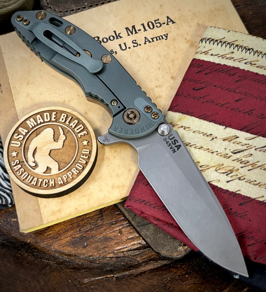 Ammo Can Green Hinderer XM-18 3.25 Spearpoint Coyote G10 Anodized Working Finish Ti and Working Finish S45VN Blade with Bronzed Out HW