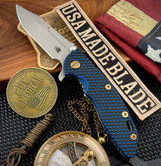 Ammo Can Green Hinderer XM-18 3.25 Fullered Harpoon Spanto Blue/Black G10 Customized Ti and Working Finish Magnacut Blade with Bronzed Out HW - USA MB