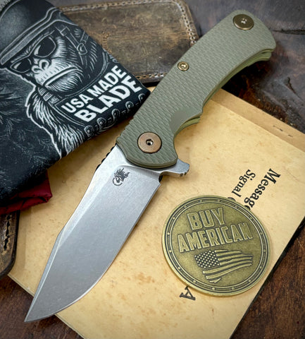 Battle Green Project X Slip Point Blade OD Green G10 Anodized Working Finish Ti with Stonewashed Finish S45VN Clip Point Blade and Bronzed Out HW