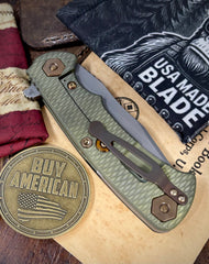 Battle Green Project X Slip Point Blade Black G10 Anodized Working Finish Ti with Working Finish S45VN Clip Point Blade and Bronzed Out HW