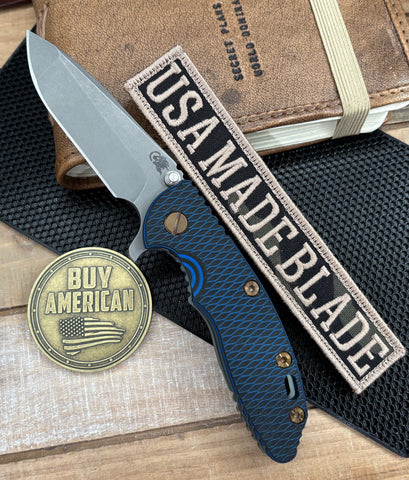Topo Ammo Can Green Hinderer XM-18 3.25 Spanto Blue/Black G10 Anodized Working Finish Topo Ti Working Finish Magnacut Blade and Sasquatch Clip - USA MB