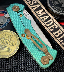 High Res Turquoise Project X Sheepsfoot Trtanslucent Green G10 Customized Stonewashed Ti with Stonewashed Magnacut Blade and Bronzed Out HW