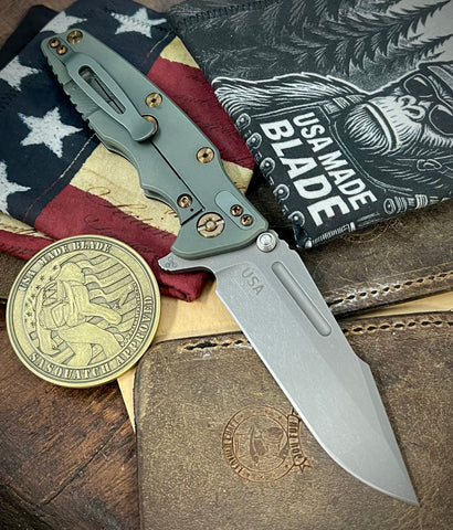 Ammo Can Green Hinderer Eklipse 3.5" Skinny Fullered Harpoon Spanto Black G10 Anodized Working Finish Ti and Working Finish Magnacut Blade with bronzed out hardware
