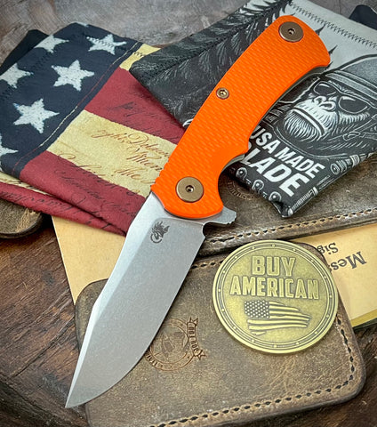 Ammo Can Green Project X Orange G10 Anodized Working Finish Ti with Stonewashed Finish S45VN Clip Point Blade and Bronzed Out HW