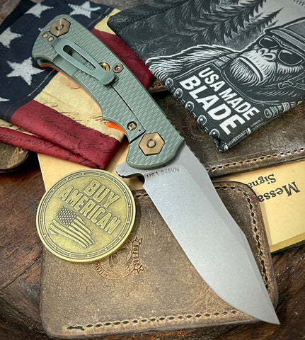 Ammo Can Green Project X Orange G10 Anodized Working Finish Ti with Working Finish S45VN Clip Point Blade and Bronzed Out HW