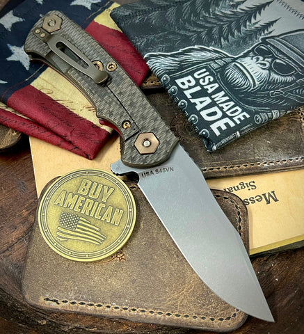 Battled Stars and Stripes Project X Red G10 Battle Bronze Ti with Working Finish S45 Clip Point Blade Bronzed Out HW