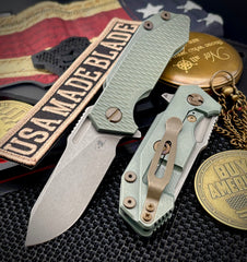 Ammo Can Green Hinderer Half Track Slicer Gen 2  Working Finish Textured Ti Presentation Side, Smooth Lock Side, and Working Finish Magnacut Blade with Bronzed Out Working Finish Hardware - USA MB