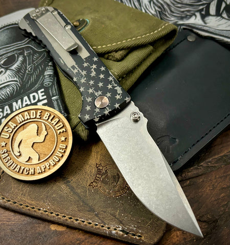 Defiant-7 Talos Button Lock Battled Stars & Stripes with Magnacut Blade and Black Hardcoat Anodized Aluminum Handles