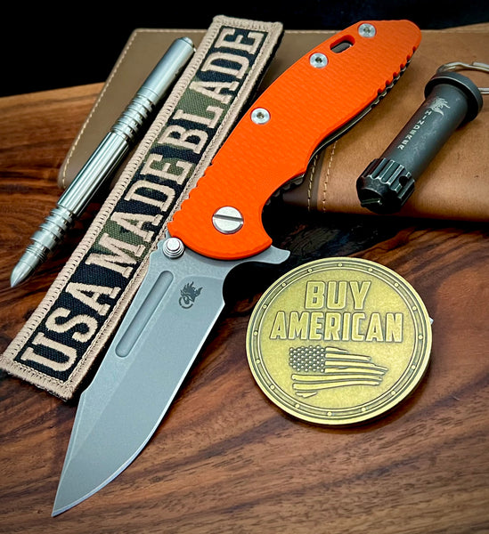 Hinderer XM-18 3.25 Fullered Harpoon Spanto Orange G10 Battle Bronze Ti and Working Finish Magnacut Blade