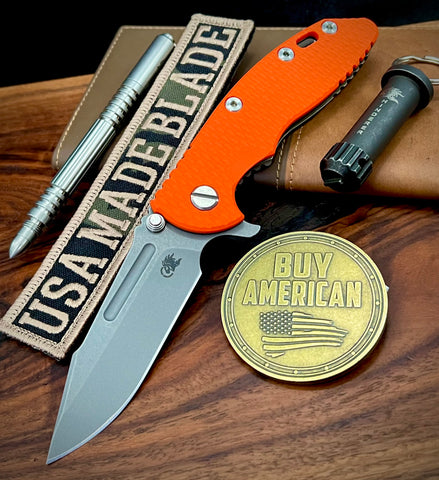 Hinderer XM-18 3.25 Fullered Harpoon Spanto Orange G10 Battle Bronze Ti and Working Finish Magnacut Blade