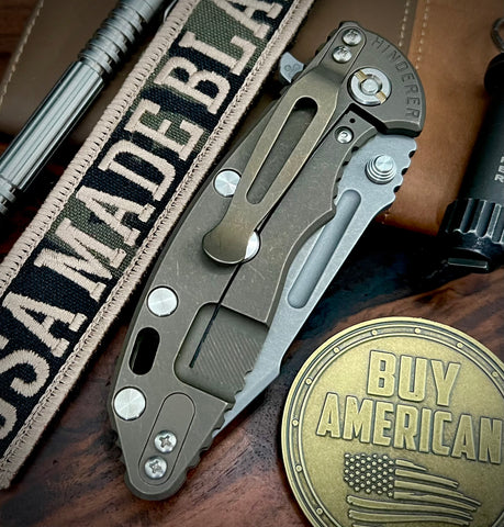 Hinderer XM-18 3.25 Fullered Harpoon Spanto OD Green G10 Battle Bronze Ti and Working Finish Magnacut Blade