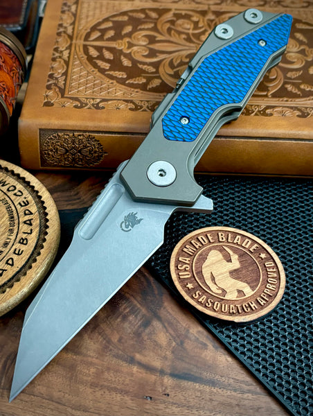 Hinderer Full Track Wharncliffe Battle Bronze Ti with Blue/Black G10 and Working Finish S45VN Blade