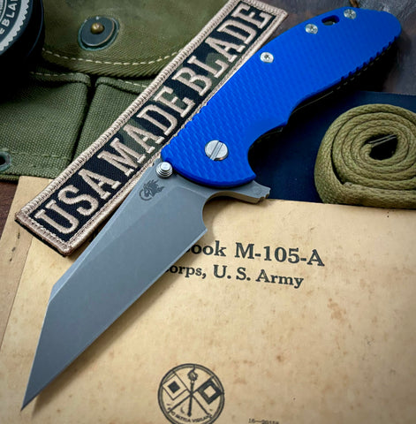 Hinderer XM-24 Skinny Wharncliffe Battle Bronze Ti Blue G10 with S45VN Working Finish Blade