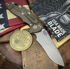 Hinderer XM-18 3.5" Recurve Non-flipper Black G10 Battle Bronze Ti Working Finish Magnacut Blade