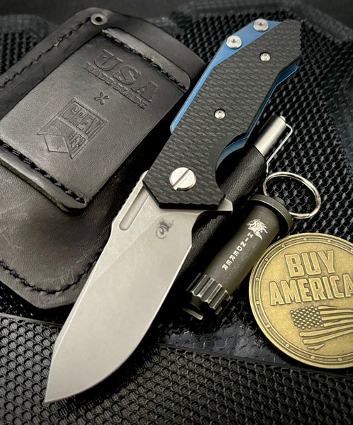 Hinderer Half Track Slicer Gen 2 Black G10 Battle Blue Ti and Working Finish Magnacut Blade