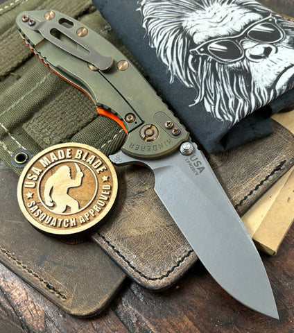 Battle Green Hinderer XM-18 3.5" Hollow Ground Slicer Anodized Ti Orange G10 20CV Working Finish Blade Bronzed Out HW