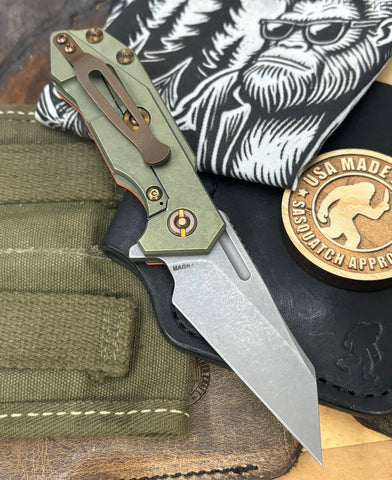 Battle Green Wharnie Hinderer Half Track Gen 2 Orange G10 Anodized Working Finish Ti with Working Finish Magnacut Blade and Bronzed Out HW