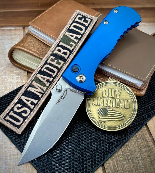 Defiant-7 Talos Button Lock with Magnacut Blade and Blue Hardcoat Anodized Aluminum Handles