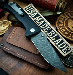 Defiant-7 Talos Button Lock with Black Boomerang Stainless Chad Nichols Damascus Blade and Black Hardcoat Anodized Aluminum Handles