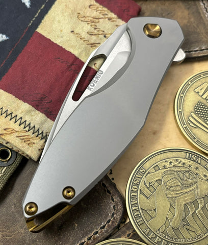 Koenig Arius Flipper Plain Ti Burnished Blade with Polished Flats M390 and Bronze Ti Hardware AR11111331 - USA MB